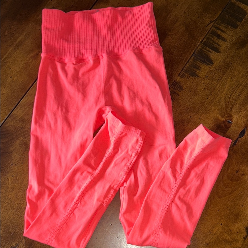 NWOT Free people fluorescent orange women’s Leggings
